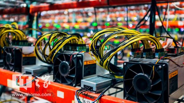 Miners working on setting up a mining rig in a large warehouse.