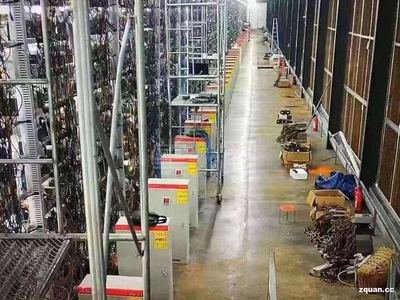 A high-tech mining farm facility nestled in Texas with rows of mining machines humming